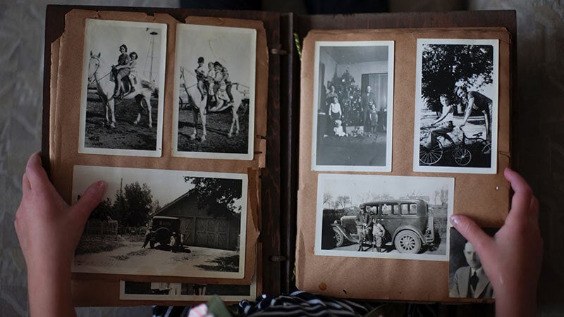 old photo album with black and white photos