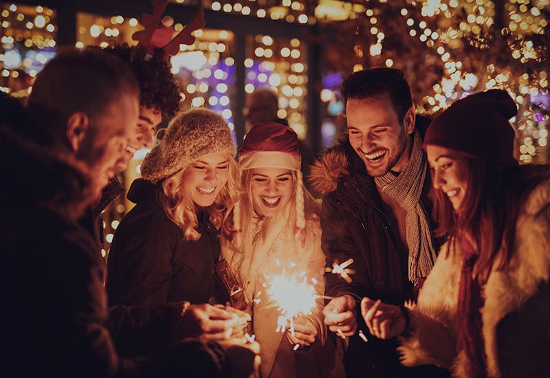 Friends celebrating at Christmas party outside of El Segundo