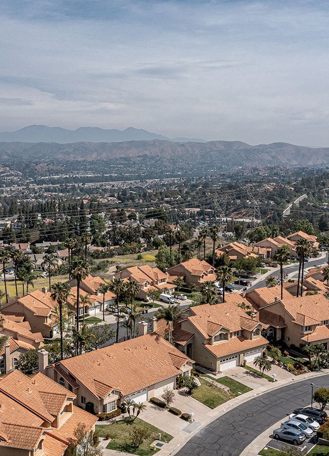 Opal Cremation, Serving Orange County, CA aerial view of anaheim california neighborhood, city in distance