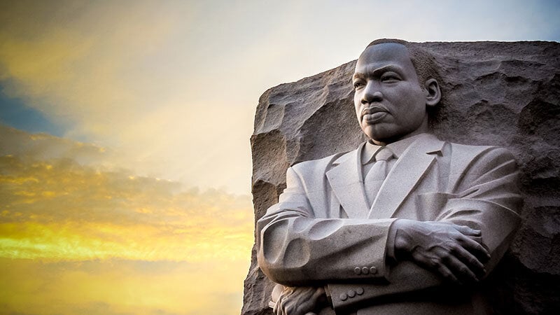 memorial statue of MLK with beautiful sunset sky
