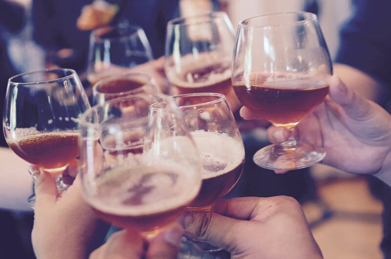 friends and family toasting the memory of a deceased loved one