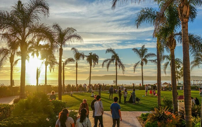 beach in san diego, with people holding celebration of life event