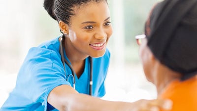 hospice nurse with patient