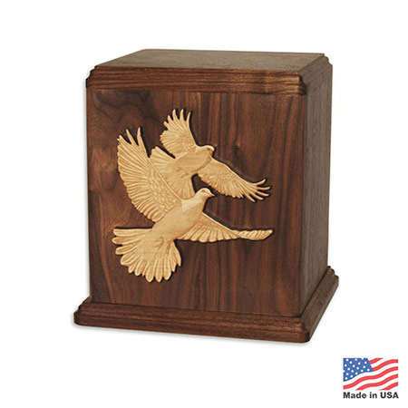 wooden cremation companion urn with doves on front