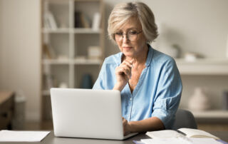 A woman looks over direct cremation options to determine which is right for her family.