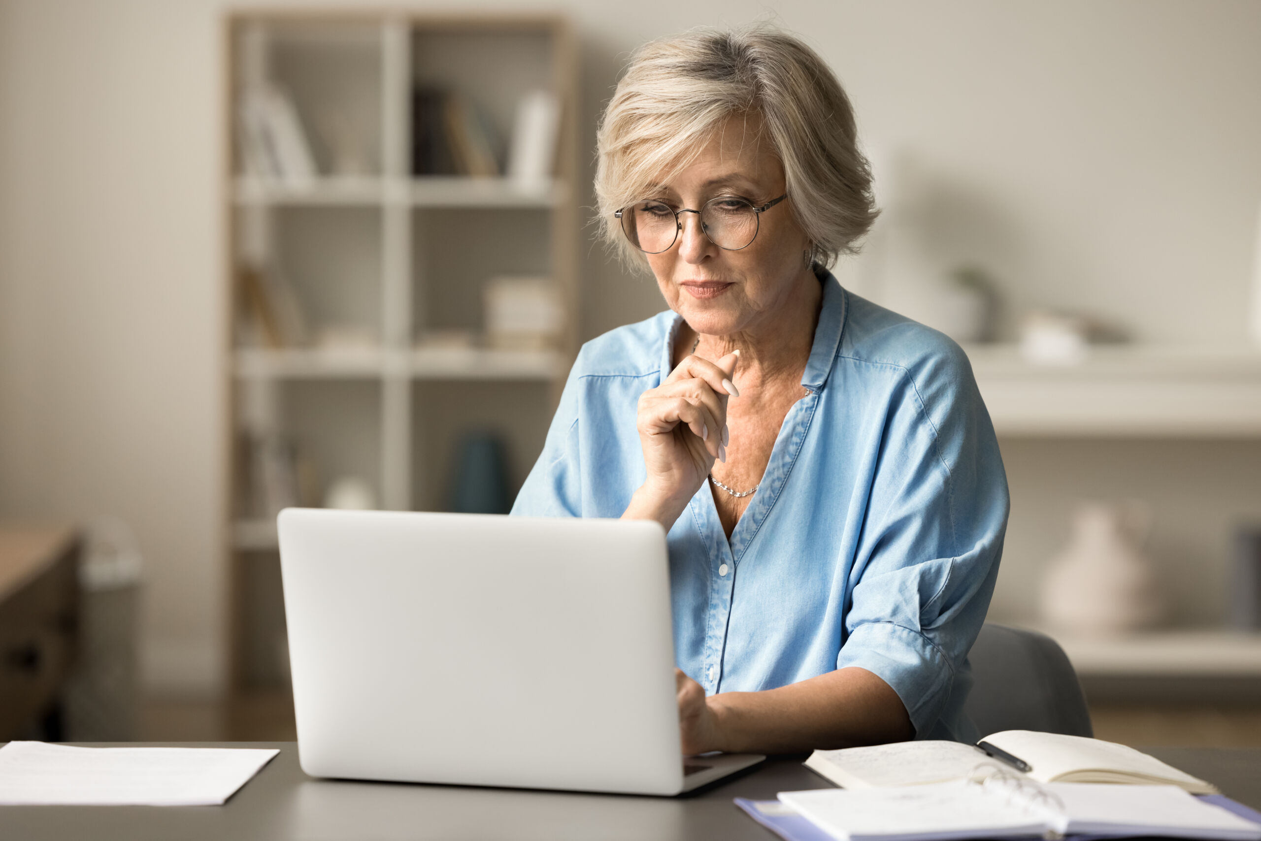 A woman looks over direct cremation options to determine which is right for her family.