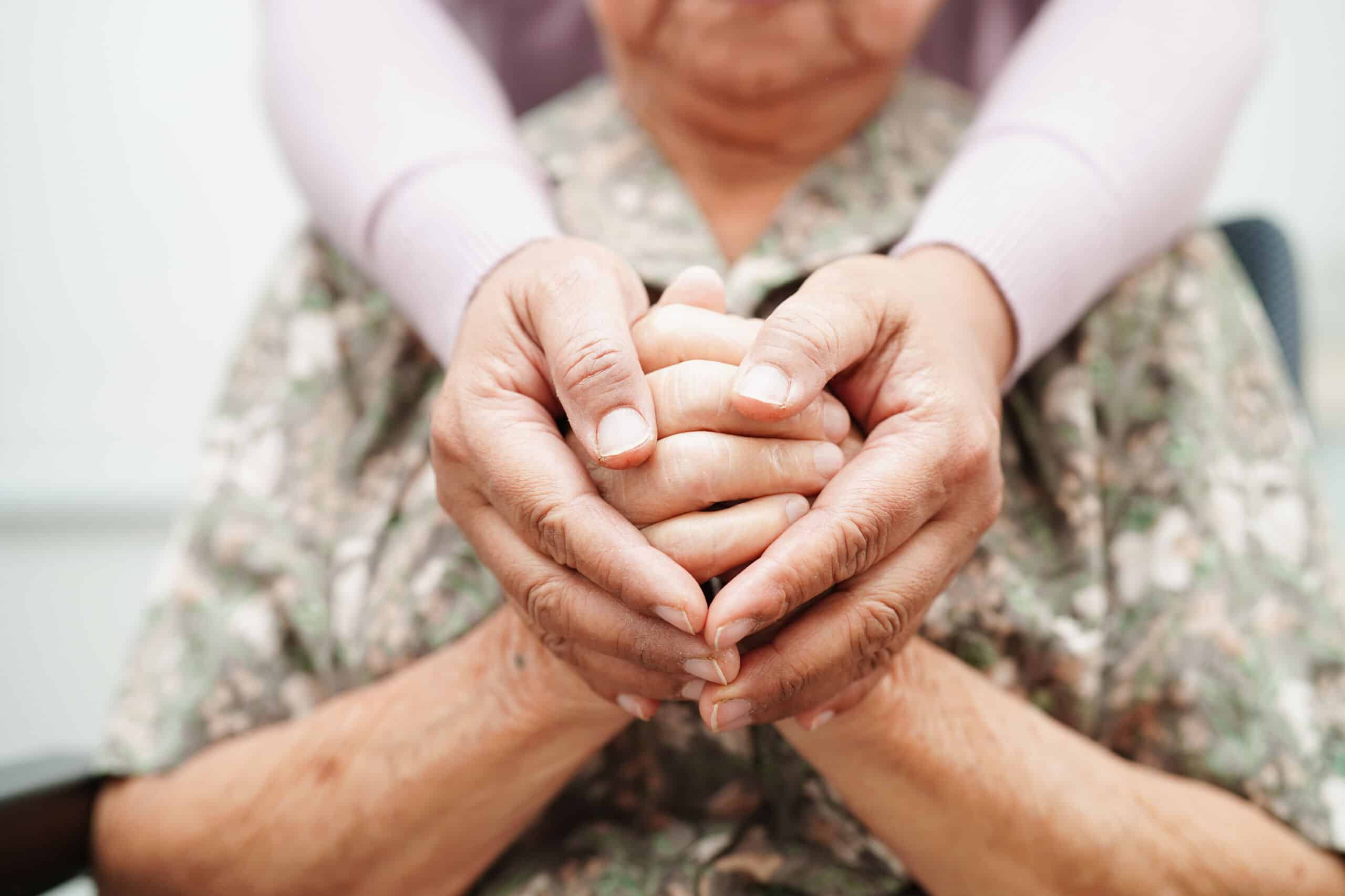 Death doula comforts a client