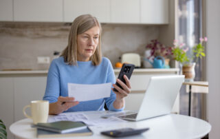 Woman researches cremation costs in California