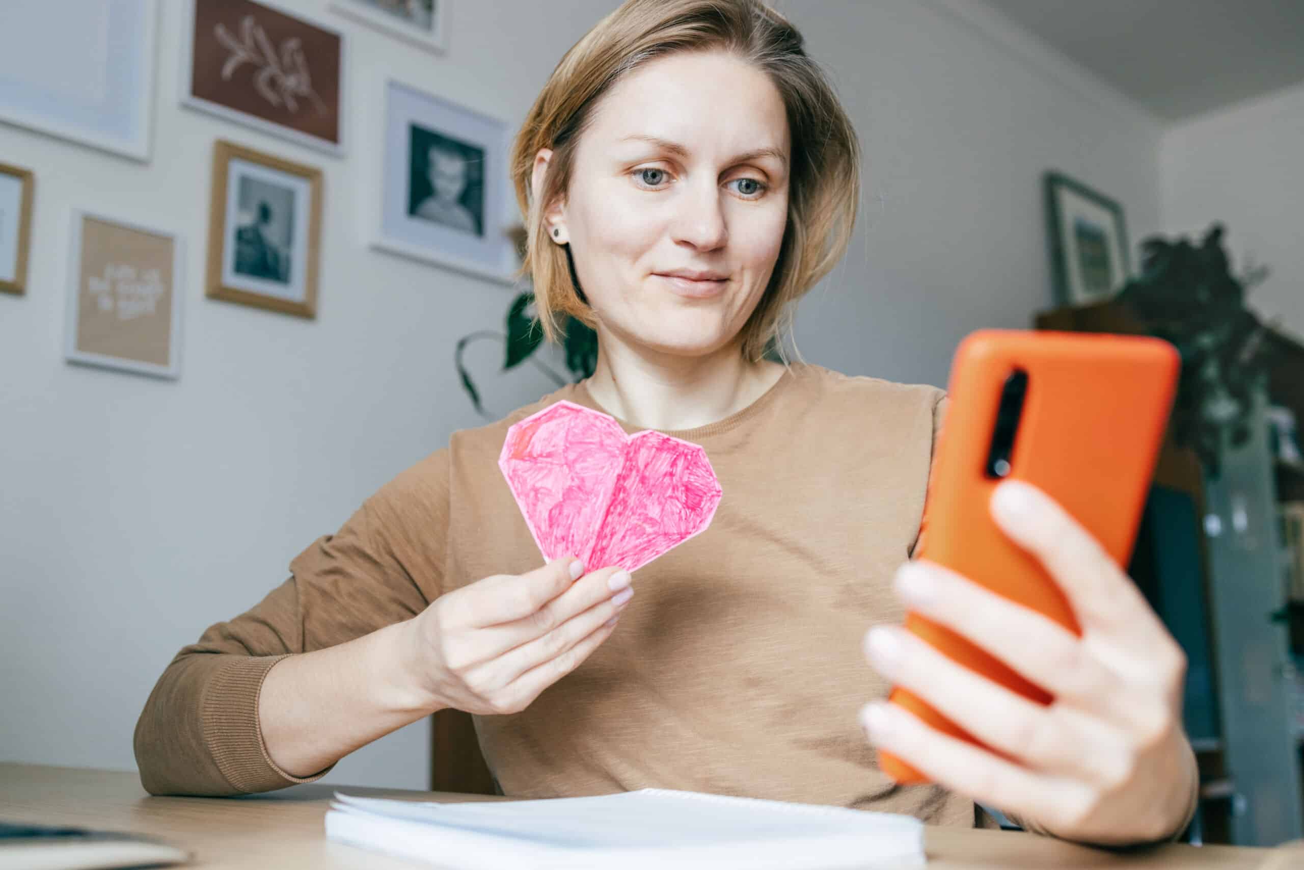 Woman remembers loved one through social media signifying What Happens to Your Online Accounts When You Pass